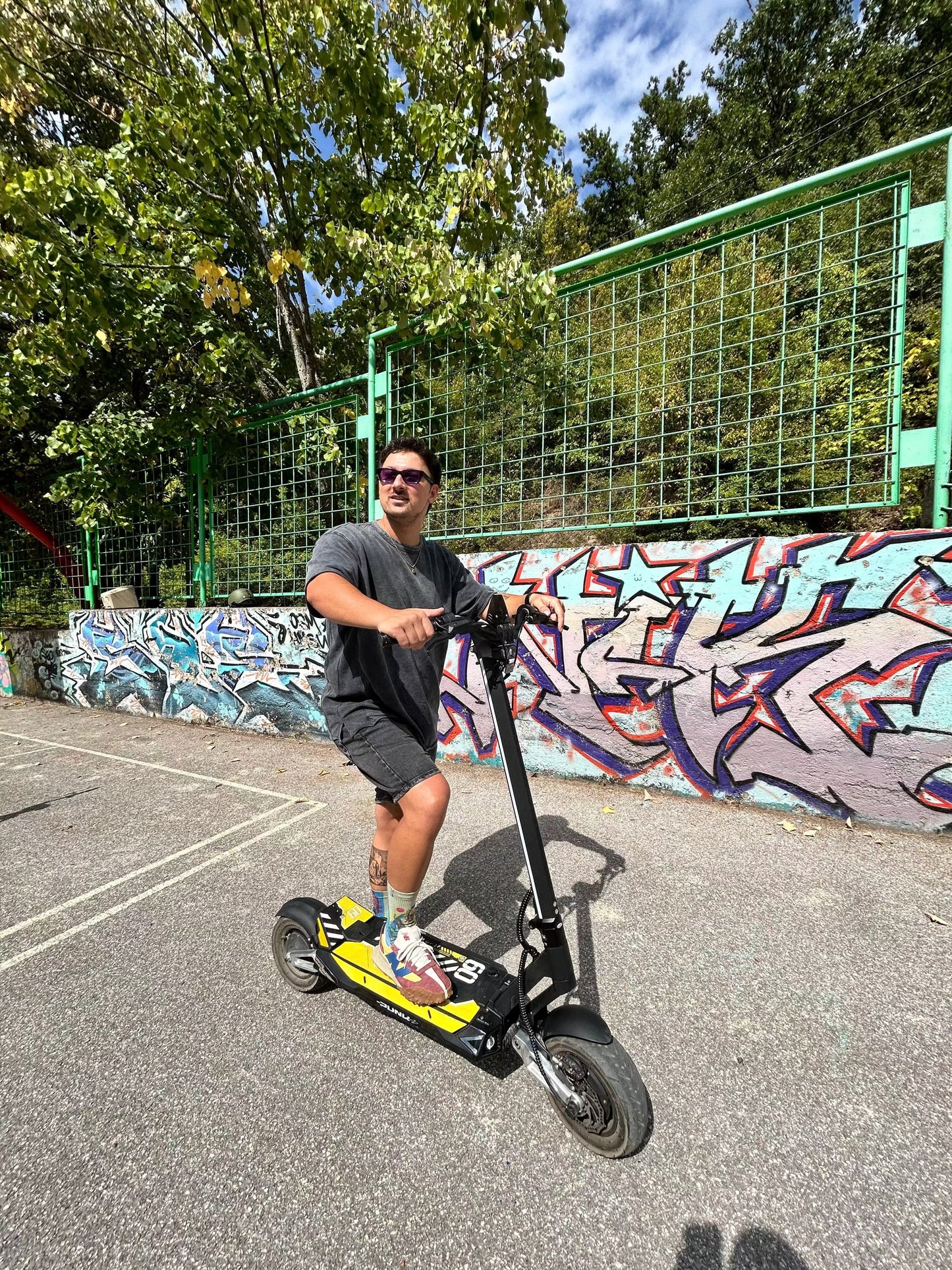 Punk Rebel Electric Scooter with dual motors, hydraulic disc brakes, 84-mile range, and durable tires for powerful commuting