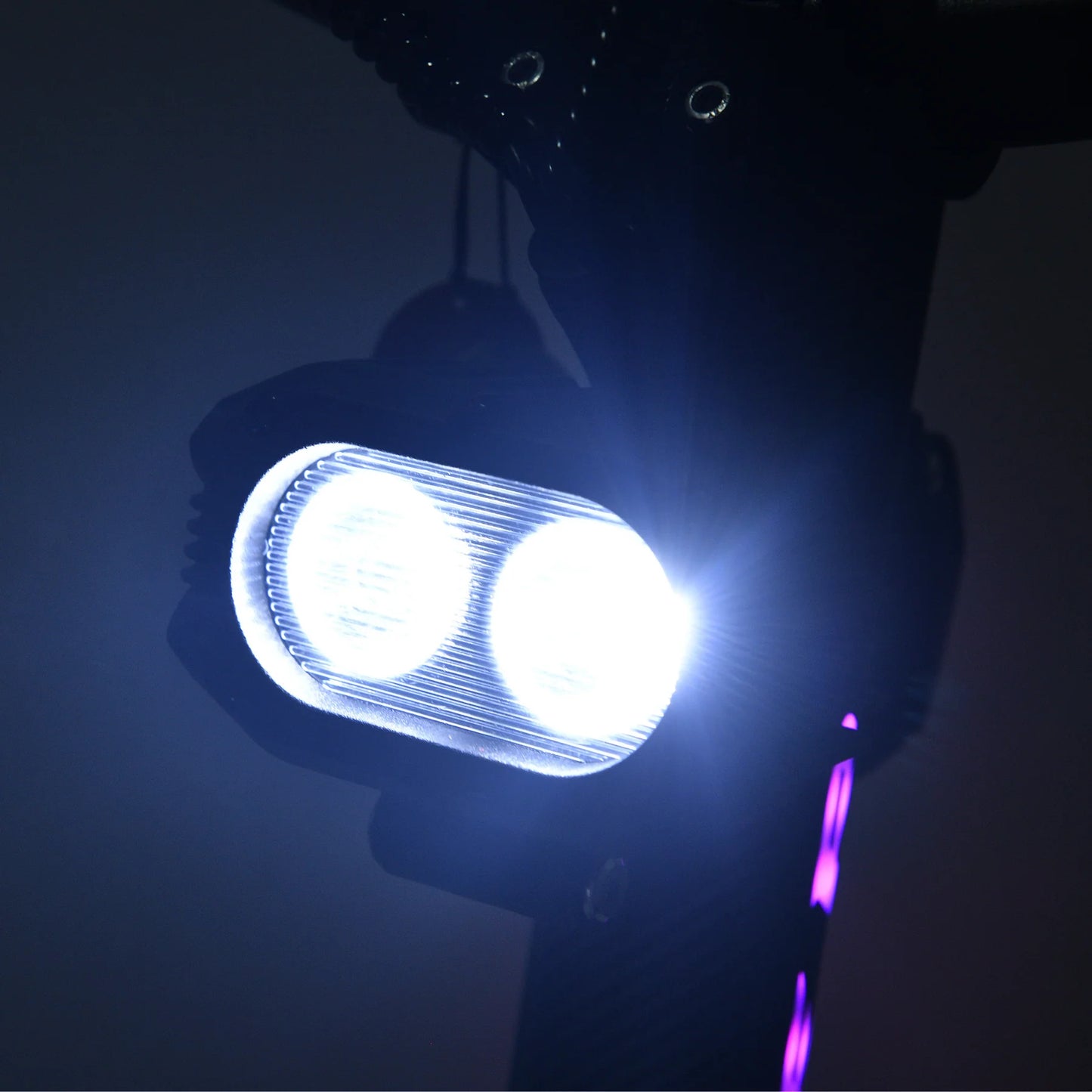 Motorcycle headlight with a dark background