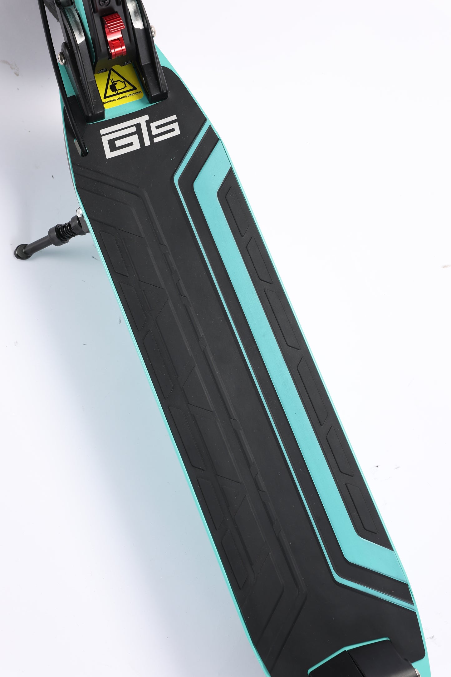 Close-up of a skateboard with a visible brand logo on a white background