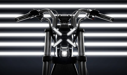 Motorcycle handlebar with headlight against a striped background